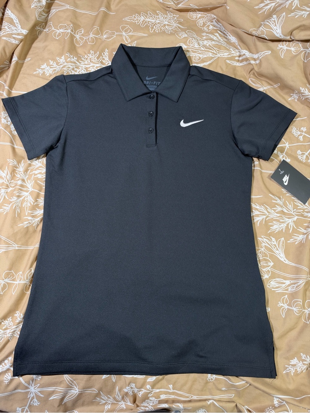 Nike Black Women’s Dri-FIT Polo with White Swoosh